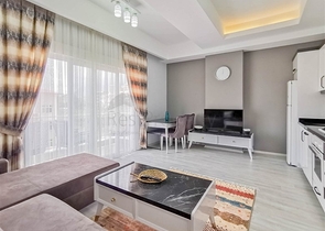 Меблированная квартира планировки 1+1 в 15 минутах от моря