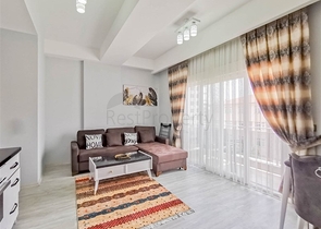 Меблированная квартира планировки 1+1 в 15 минутах от моря