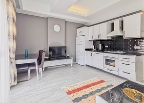 Меблированная квартира планировки 1+1 в 15 минутах от моря