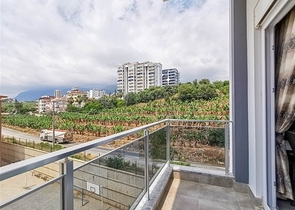 Меблированная квартира планировки 1+1 в 15 минутах от моря