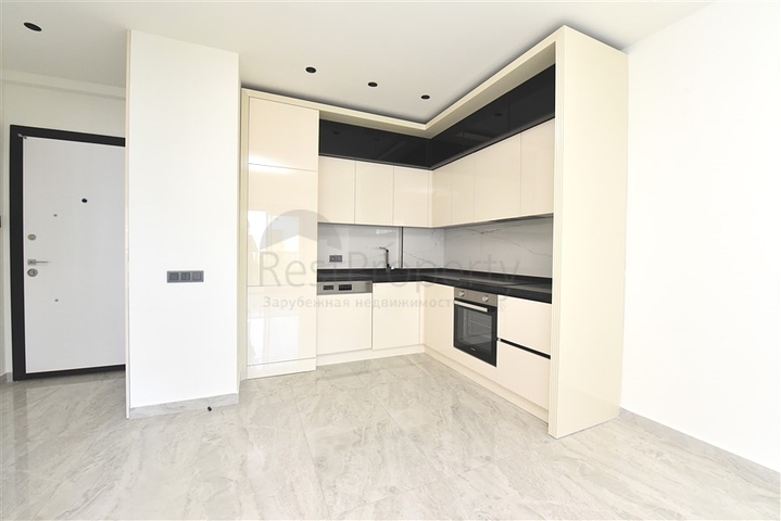 Квартира 1+1 в новом элитном жилом комплексе в 300 м от пляжа Клеопатры 