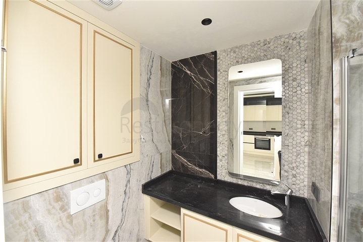 Квартира 1+1 в новом элитном жилом комплексе в 300 м от пляжа Клеопатры 