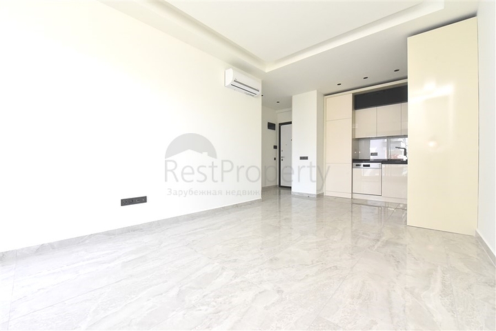 Квартира 1+1 в новом элитном жилом комплексе в 300 м от пляжа Клеопатры 