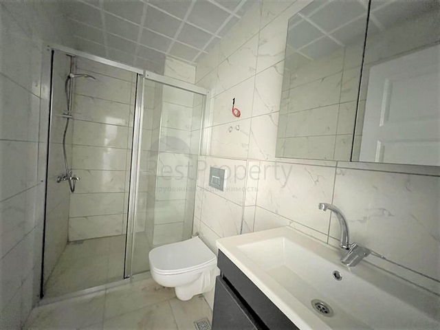 Квартиру 1+1 в 500м от моря в Махмутларе