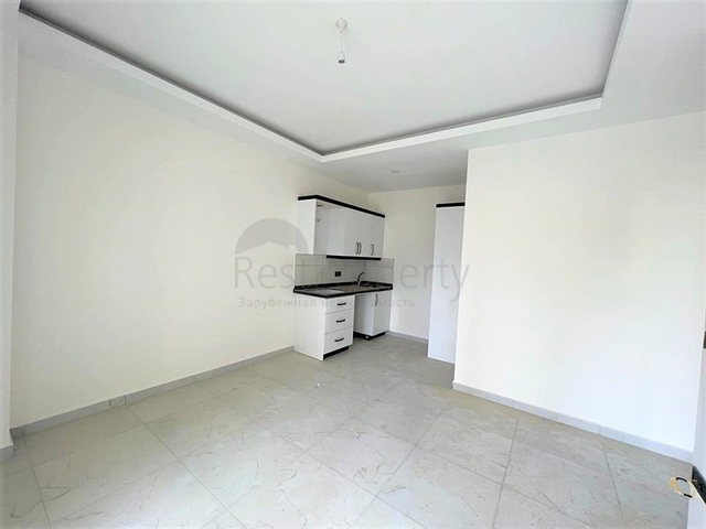 Квартиру 1+1 в 500м от моря в Махмутларе