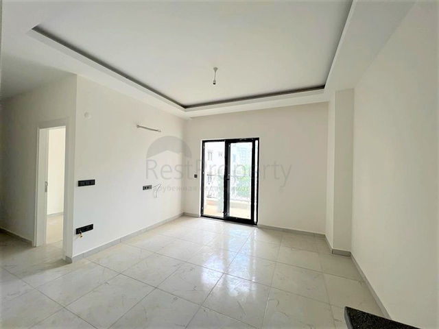 Квартиру 1+1 в 500м от моря в Махмутларе