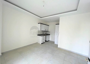 Квартиру 1+1 в 500м от моря в Махмутларе