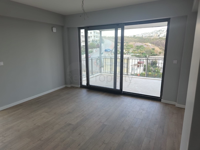 Комфортабельные апартаменты 2+1  в комплексе с видом на озеро и горы в районе Богазичи