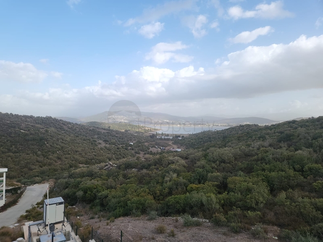 Комфортабельные апартаменты 2+1  в комплексе с видом на озеро и горы в районе Богазичи