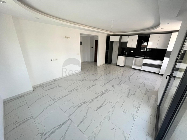 Квартира с видом на море в новом комплексе Махмутлара