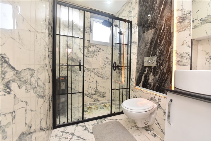 Просторная квартира на первой береговой линии в районе Махмутлар