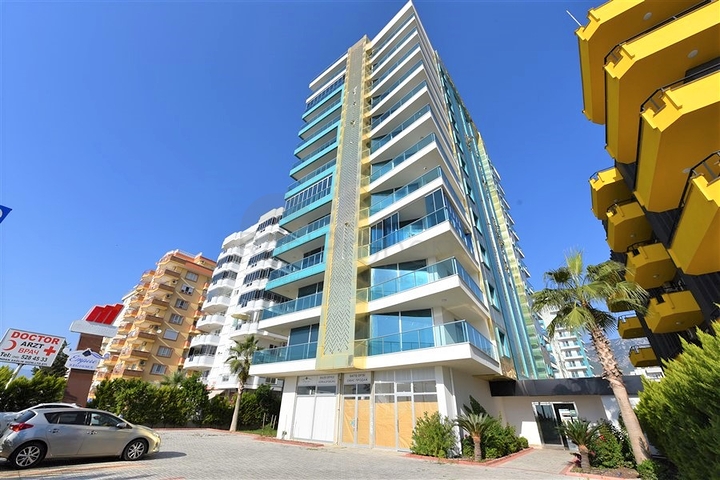 Просторная квартира на первой береговой линии в районе Махмутлар