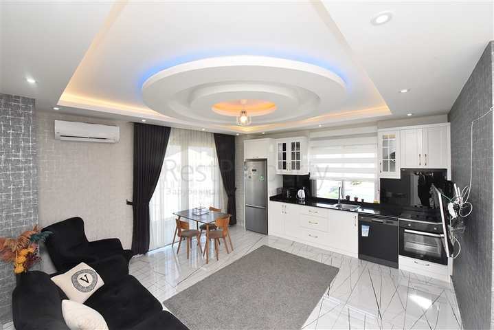 Просторная квартира на первой береговой линии в районе Махмутлар