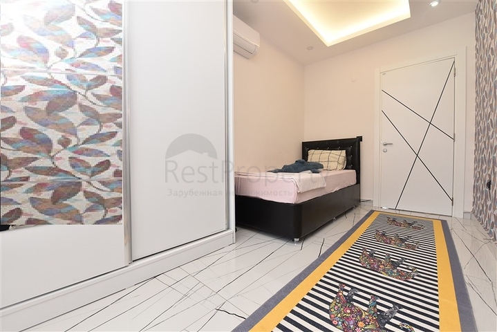 Просторная квартира на первой береговой линии в районе Махмутлар