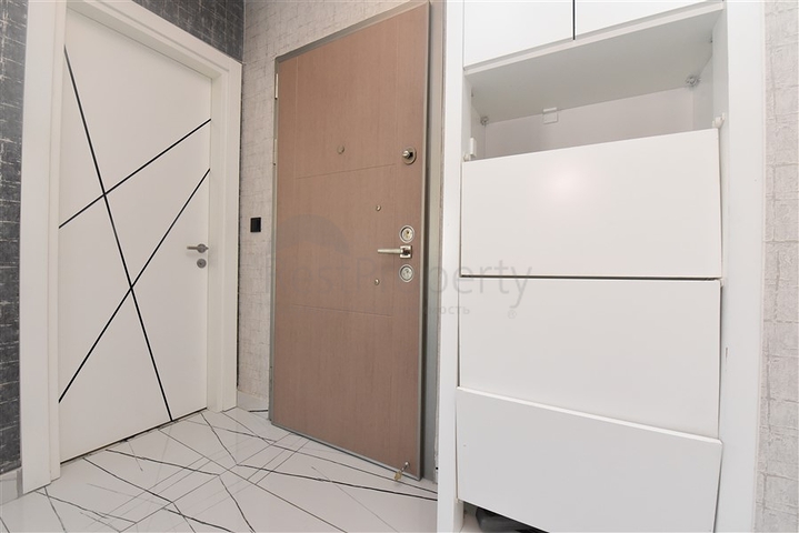 Просторная квартира на первой береговой линии в районе Махмутлар