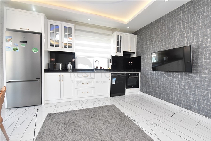 Просторная квартира на первой береговой линии в районе Махмутлар