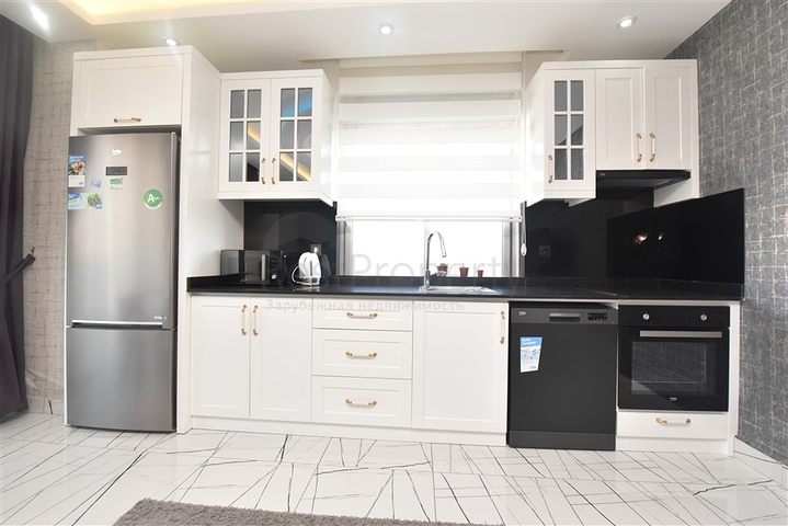 Просторная квартира на первой береговой линии в районе Махмутлар