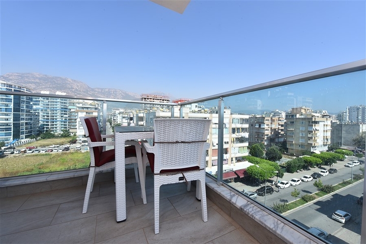 Просторная квартира на первой береговой линии в районе Махмутлар