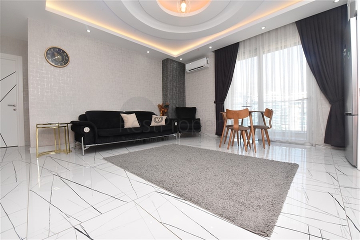 Просторная квартира на первой береговой линии в районе Махмутлар