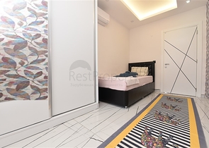 Просторная квартира на первой береговой линии в районе Махмутлар