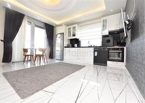 Просторная квартира на первой береговой линии в районе Махмутлар