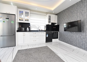 Просторная квартира на первой береговой линии в районе Махмутлар