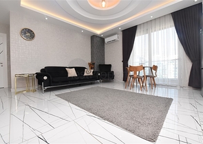 Просторная квартира на первой береговой линии в районе Махмутлар