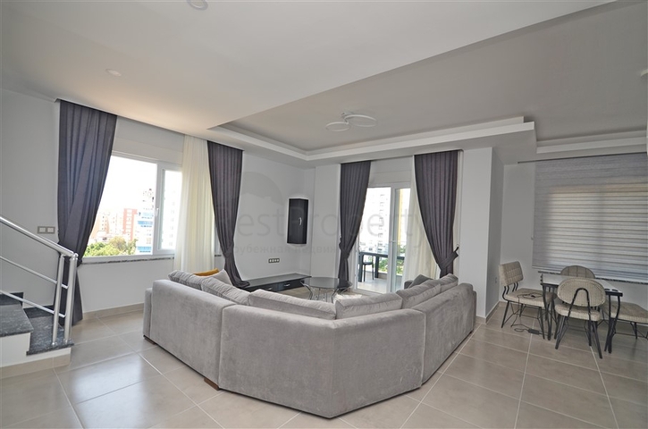 Трехкомнатная квартира в районе Махмутлар