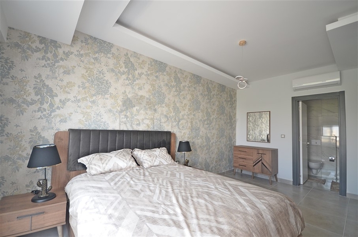 Трехкомнатная квартира в районе Махмутлар