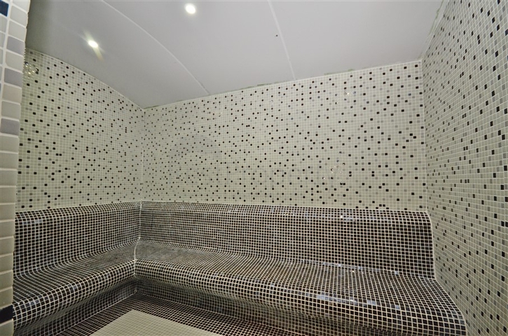 Трехкомнатная квартира в районе Махмутлар