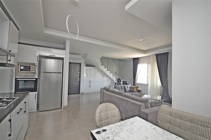 Трехкомнатная квартира в районе Махмутлар