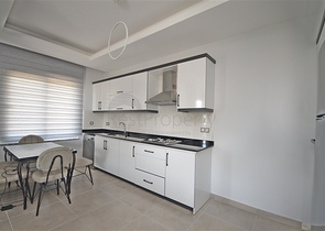 Трехкомнатная квартира в районе Махмутлар