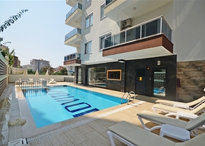 Трехкомнатная квартира в районе Махмутлар