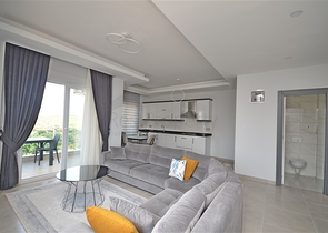 Трехкомнатная квартира в районе Махмутлар