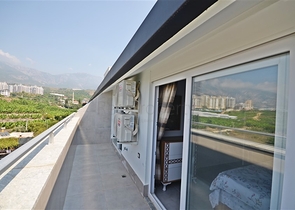 Трехкомнатная квартира в районе Махмутлар