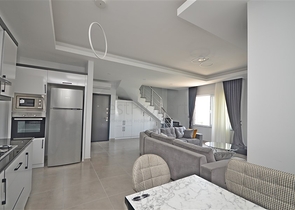 Трехкомнатная квартира в районе Махмутлар