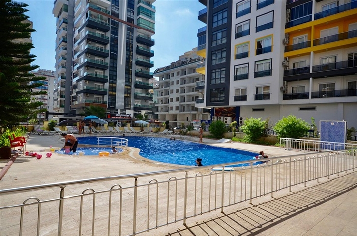 Просторная квартира 3+1 с мебелью и техникой в районе Махмутлар 