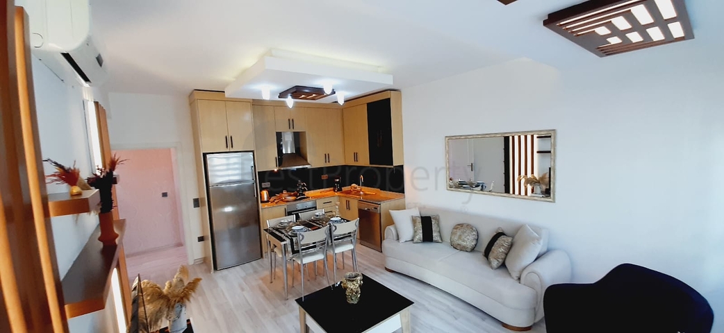 Уютная трехкомнатная квартира в центре района Махмутлар