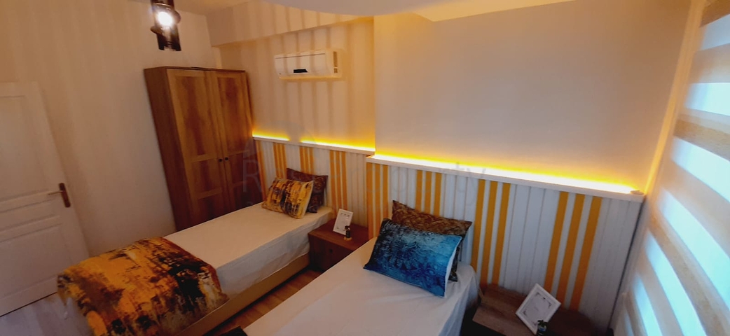 Уютная трехкомнатная квартира в центре района Махмутлар