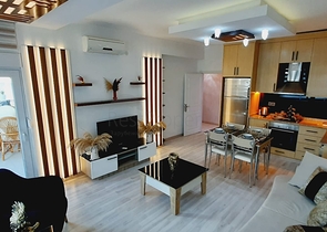 Уютная трехкомнатная квартира в центре района Махмутлар