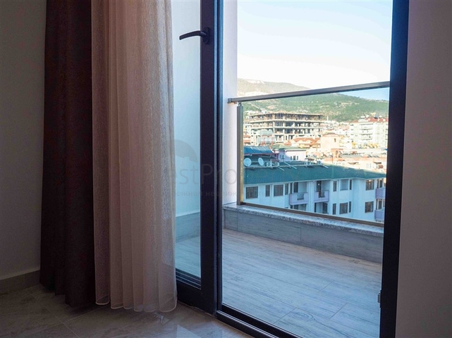 Уютная двухкомнатная квартира в жилом комплексе в центре Алании