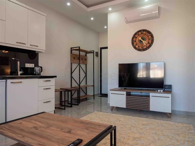 Уютная двухкомнатная квартира в жилом комплексе в центре Алании