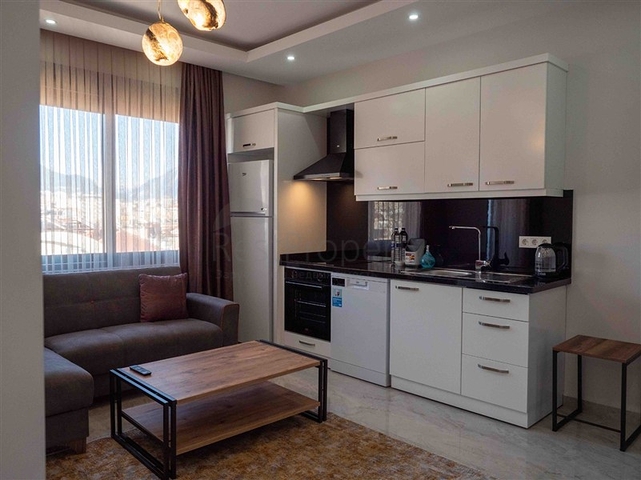 Уютная двухкомнатная квартира в жилом комплексе в центре Алании