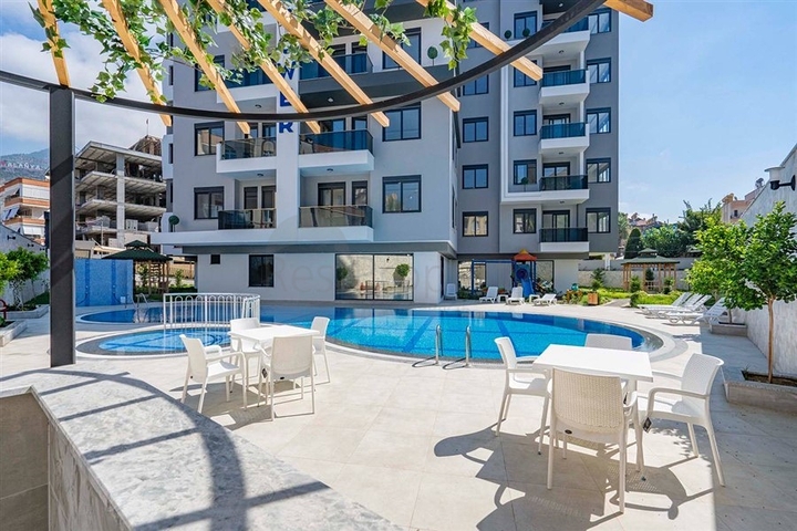 Уютная двухкомнатная квартира в жилом комплексе в центре Алании