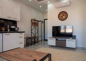 Уютная двухкомнатная квартира в жилом комплексе в центре Алании