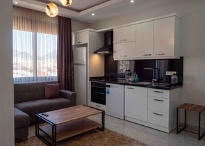 Уютная двухкомнатная квартира в жилом комплексе в центре Алании