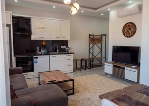 Уютная двухкомнатная квартира в жилом комплексе в центре Алании