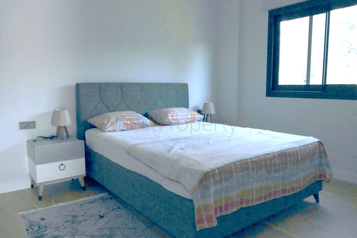 Одноэтажная вилла с террасой и бассейном в уютном комплексе в районе Яалыкавак