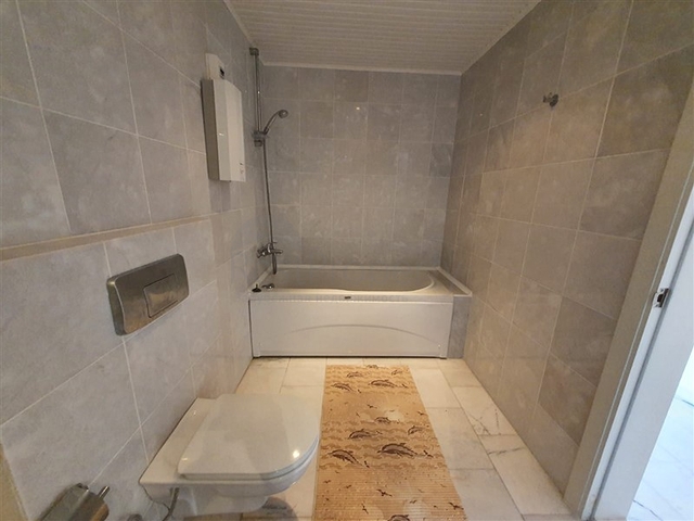 Квартира 2+1 на первой береговой линии в Тосмуре