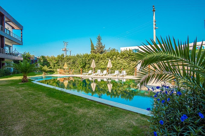 Дуплекс 2+1 с террасой и садом в центральной части Бодрума в шаговой доступности к морю